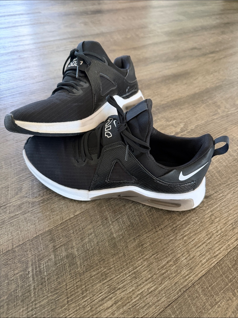 Nike WoMen’s Black Athletic Sneakers with White Midsole Accents